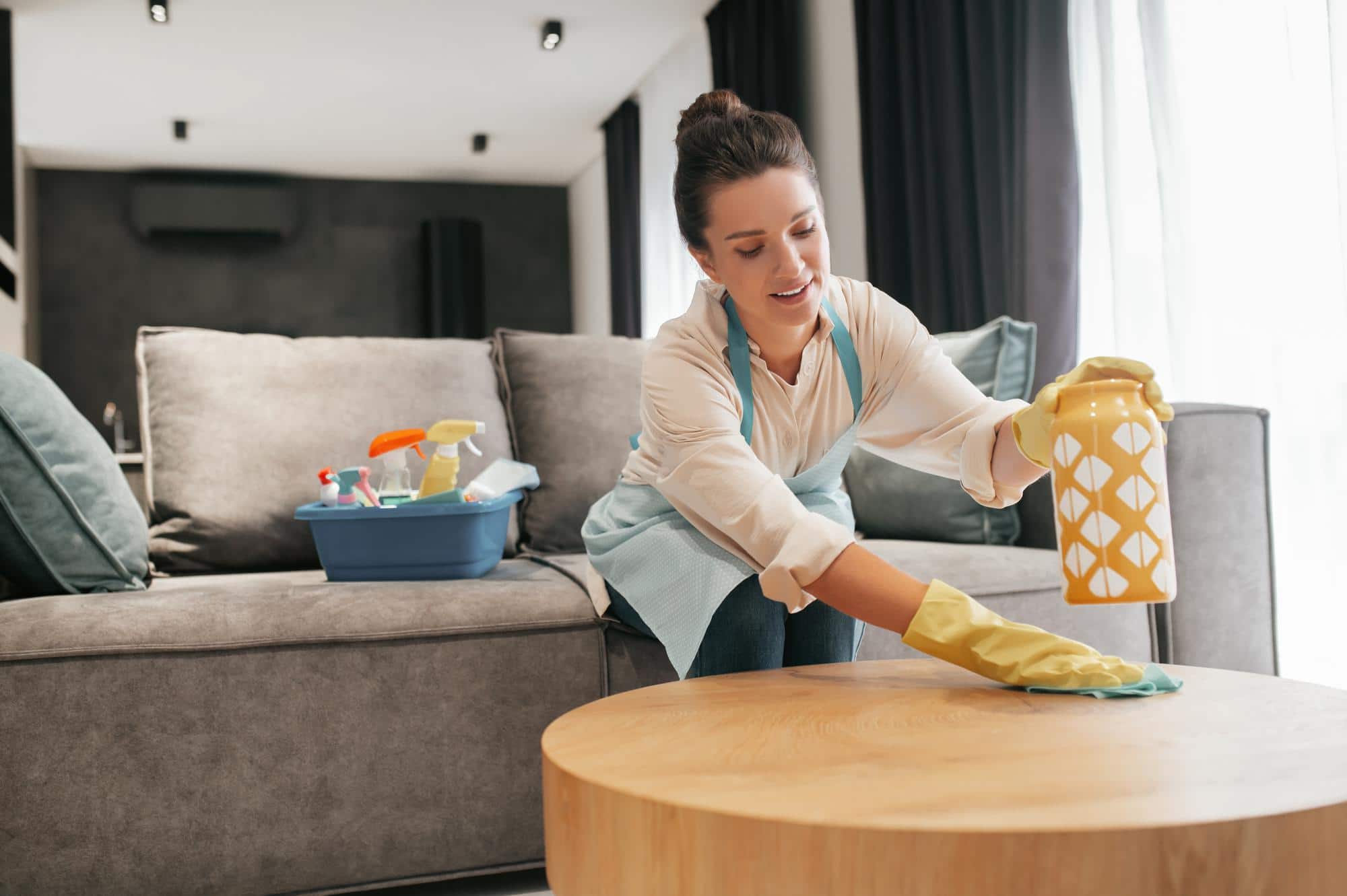 chores-woman-cleaning-table-surfcase-with-disinfector